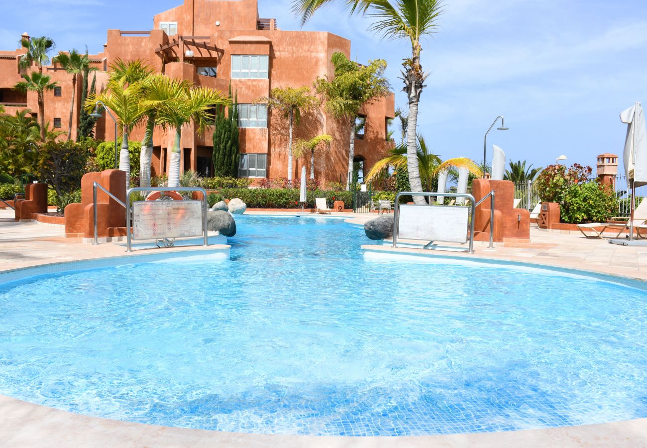 Climate controlled swimming pool sunbathing area