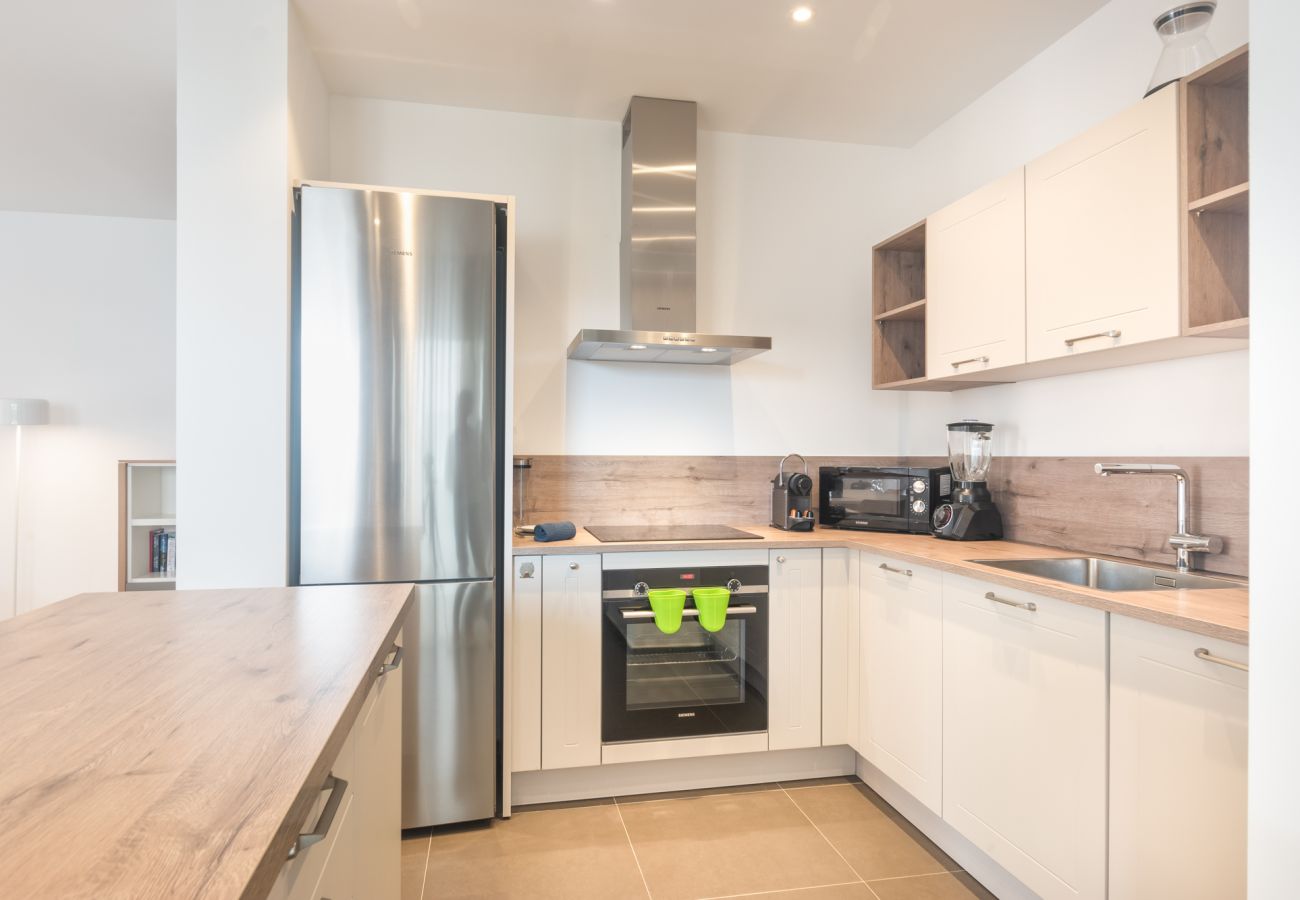 Fully equipped kitchen open to the living room