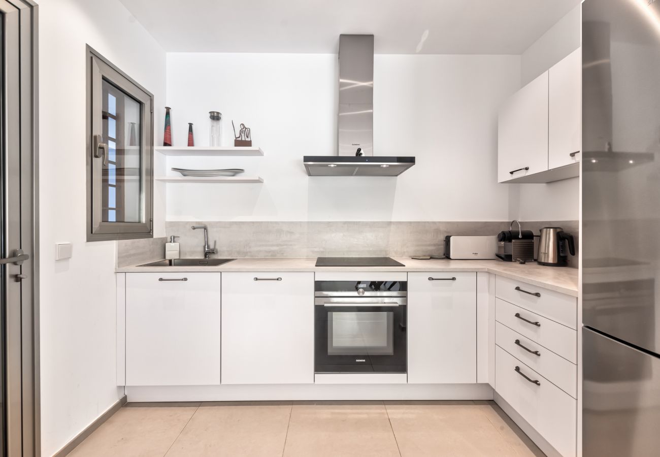 Fully equipped kitchen open to the living room