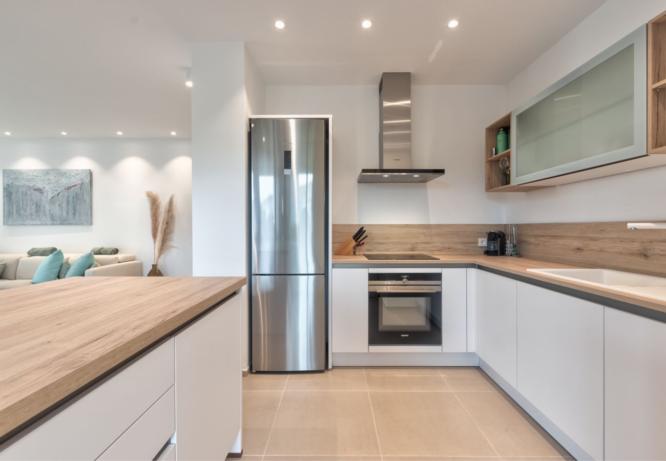 Fully equipped kitchen open to the living room